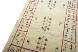 Backside of handmade New Persian Gabbeh rug showing knot structure and weave density