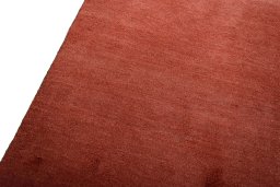 Backside of handmade New Persian Gabbeh rug showing knot structure and weave density