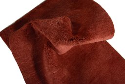 Corner detail of New Persian Gabbeh rug showing border pattern and Wool pile