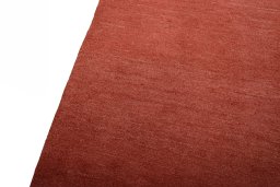 Backside of handmade New Persian Gabbeh rug showing knot structure and weave density