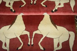 Full view of 2000s Persian Gabbeh rug from Iran / Persia, 188 × 125 cm in Red tones