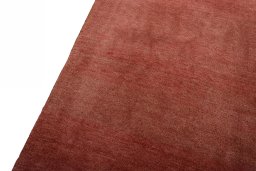 Backside of handmade New Persian Gabbeh rug showing knot structure and weave density