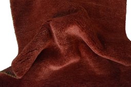 Corner detail of New Persian Gabbeh rug showing border pattern and Wool pile
