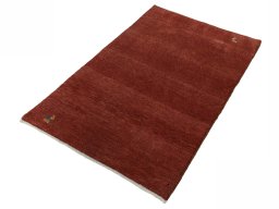 Corner detail of New Persian Gabbeh rug showing border pattern and Wool pile