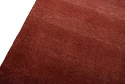 Backside of handmade New Persian Gabbeh rug showing knot structure and weave density