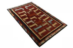 Close-up detail of 2000s Persian Gabbeh rug from Iran / Persia showing Wool weave