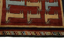 Central medallion detail of 2000s Persian Gabbeh rug from Iran / Persia