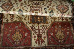 Full view of 2000s Persian Gabbeh rug from Iran / Persia, 150 × 100 cm in Beige tones
