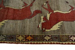 Close-up detail of 2000s Persian Gabbeh rug from Iran / Persia showing Wool weave