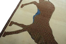 Backside of handmade 2000s Persian Gabbeh rug showing knot structure and weave density