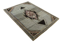 Close-up detail of 2000s Persian Gabbeh rug from Iran / Persia showing Wool weave
