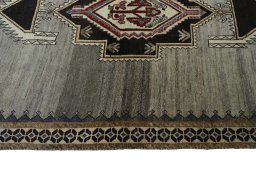 Full view of 2000s Persian Gabbeh rug from Iran / Persia, 176 × 127 cm in Gray tones