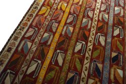 Backside of handmade 2000s Persian Gabbeh rug showing knot structure and weave density