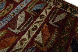 Full view of 2000s Persian Gabbeh rug from Iran / Persia, 211 × 127 cm in Red tones