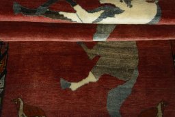 Full view of 2000s Persian Gabbeh rug from Iran / Persia, 223 × 125 cm in Red tones