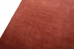 Backside of handmade New Persian Gabbeh rug showing knot structure and weave density