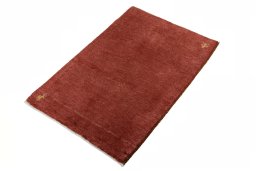 Corner detail of New Persian Gabbeh rug showing border pattern and Wool pile