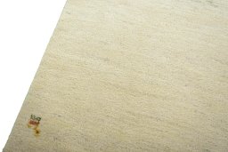 Backside of handmade New Persian Gabbeh rug showing knot structure and weave density