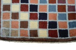 Central medallion detail of 2000s Persian Gabbeh rug from Iran / Persia
