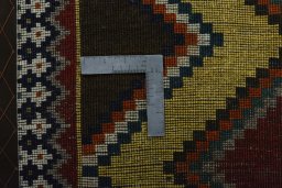 Close-up detail of 2000s Persian Gabbeh rug from Iran / Persia showing Wool weave