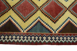 Close-up detail of 2000s Persian Gabbeh rug from Iran / Persia showing Wool weave