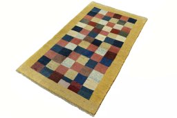 Corner detail of New Persian Gabbeh rug showing border pattern and Wool pile