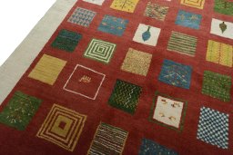 Backside of handmade New Persian Gabbeh rug showing knot structure and weave density