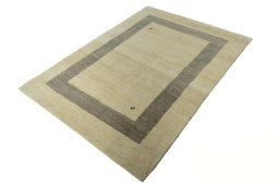 Corner detail of New Persian Gabbeh rug showing border pattern and Wool pile