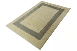 Corner detail of New Persian Gabbeh rug showing border pattern and Wool pile