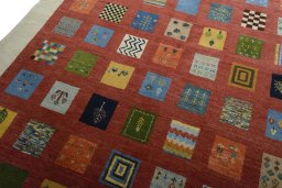 Backside of handmade New Persian Gabbeh rug showing knot structure and weave density