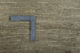 Corner detail of New Persian Gabbeh rug showing border pattern and Wool pile