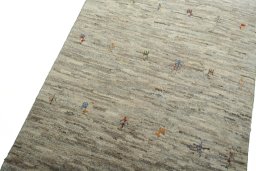 Backside of handmade New Persian Gabbeh rug showing knot structure and weave density