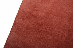Backside of handmade New Persian Gabbeh rug showing knot structure and weave density