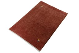 Corner detail of New Persian Gabbeh rug showing border pattern and Wool pile