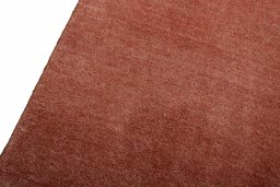 Backside of handmade New Persian Gabbeh rug showing knot structure and weave density