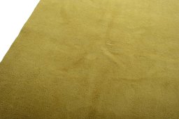 Backside of handmade New Persian Gabbeh rug showing knot structure and weave density