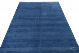 Surface texture of New Persian Gabbeh rug with natural Wool and intricate pattern