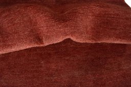 Corner detail of New Persian Gabbeh rug showing border pattern and Wool pile