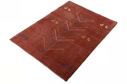 Corner detail of New Persian Gabbeh rug showing border pattern and Wool pile