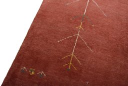 Backside of handmade New Persian Gabbeh rug showing knot structure and weave density