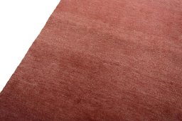 Backside of handmade New Persian Gabbeh rug showing knot structure and weave density