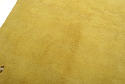 Backside of handmade New Persian Gabbeh rug showing knot structure and weave density