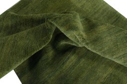 Corner detail of New Persian Gabbeh rug showing border pattern and Wool pile