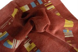 Corner detail of New Persian Gabbeh rug showing border pattern and Wool pile