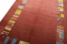 Backside of handmade New Persian Gabbeh rug showing knot structure and weave density
