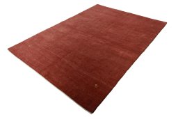 Corner detail of New Persian Gabbeh rug showing border pattern and Wool pile