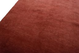 Backside of handmade New Persian Gabbeh rug showing knot structure and weave density