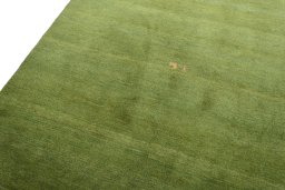 Backside of handmade New Persian Gabbeh rug showing knot structure and weave density