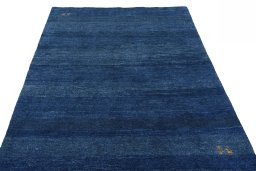 Surface texture of New Persian Gabbeh rug with natural Wool and intricate pattern