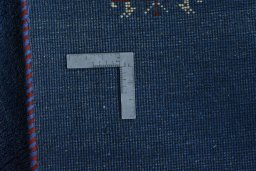 Close-up detail of New Persian Gabbeh rug from Iran / Persia showing Wool weave